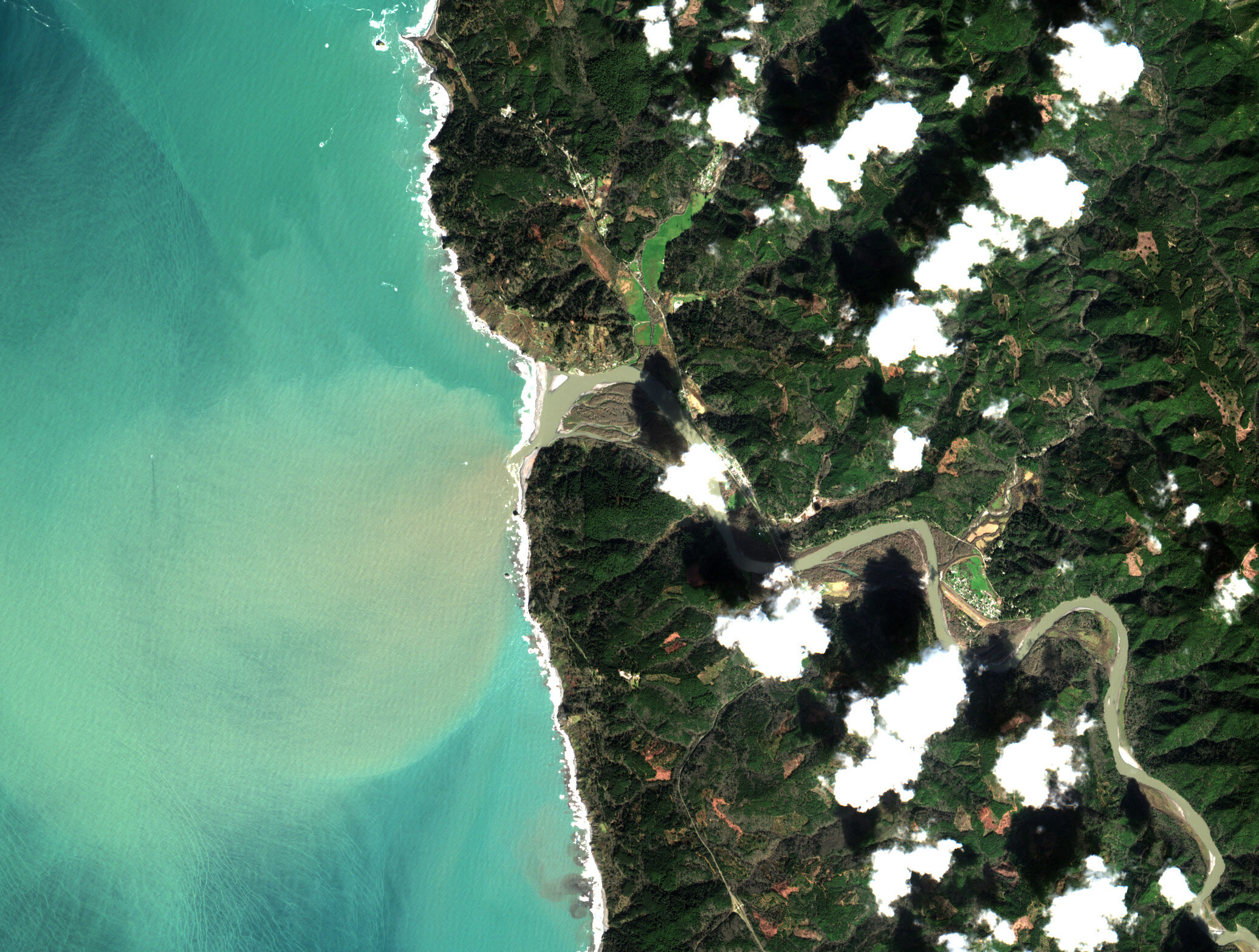 Sentinel-2 satellite image of the Klamath River mouth — sediment plume dispersing into the Pacific Ocean